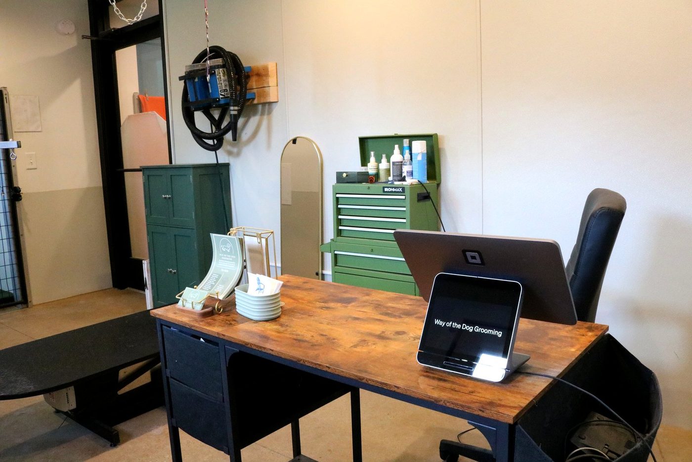 The grooming table, dryer and supply cabinet